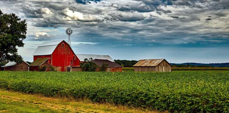 Red barn with cloudy sky